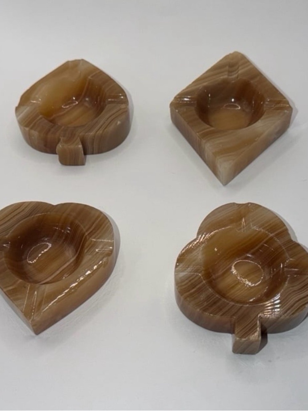 Set of Four 1970’s Onyx Ashtrays Carved in to the Shapes of the 4 Card Suits
